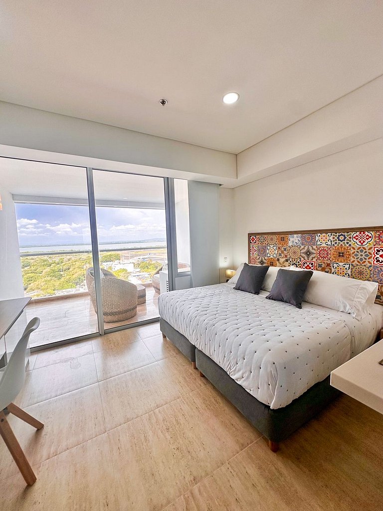 Estilo caribeño con vista al aeropuerto y cerca del mar CB13