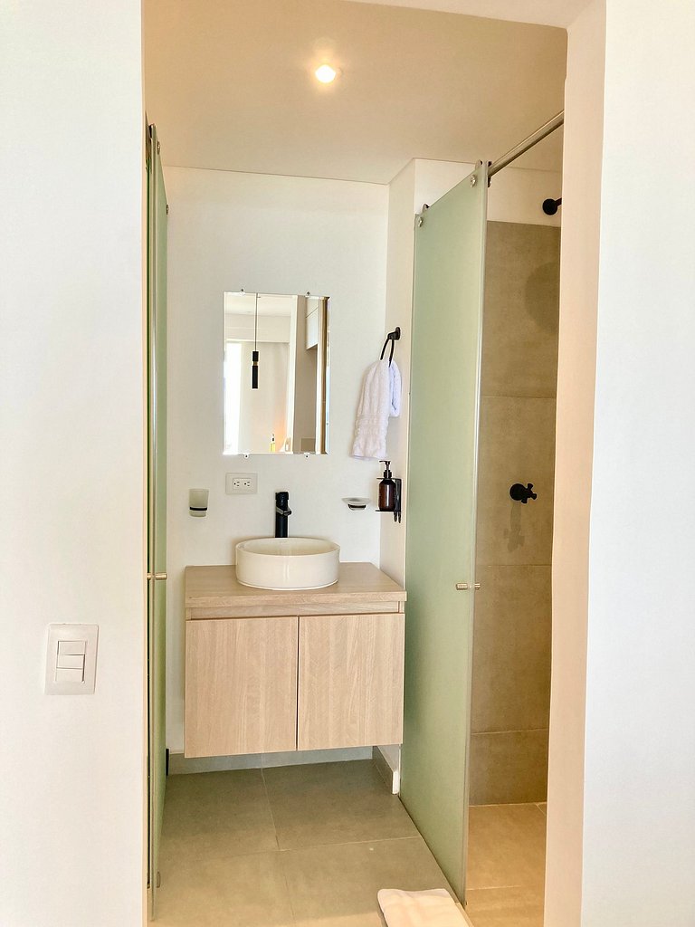 Suite moderna con vista al mar y parque CB 814