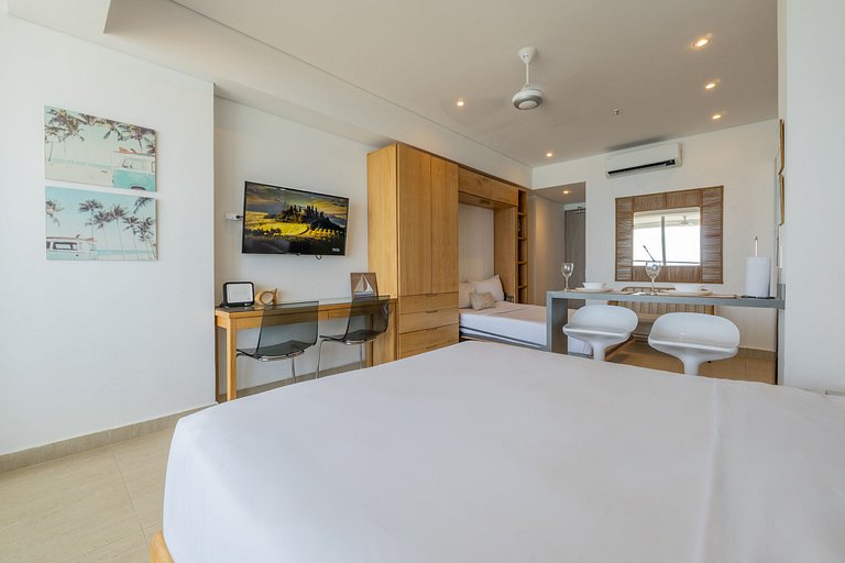 Suite vista al mar con hamaca y 2 camas queen p 12