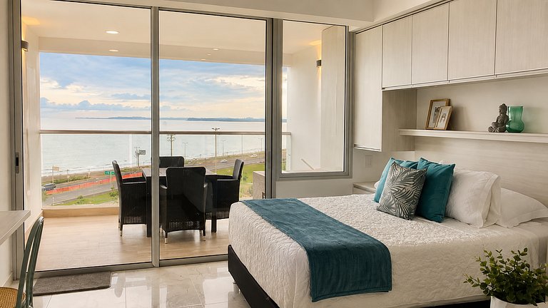 CB726 | Suite moderna frente al mar con balcón y cocina con